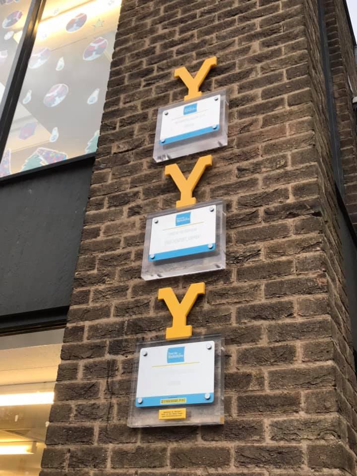 The tour de yorkshire awards on a wall